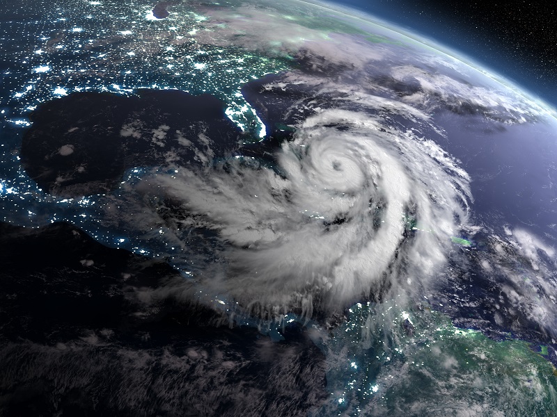 Earth at night from orbit with city lights and huge hurricane near florida, USA. 3D illustration. Elements of this image furnished by NASA