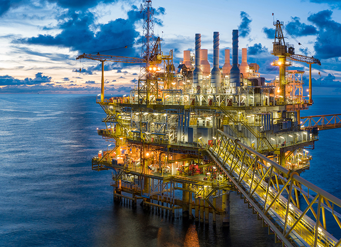 Panorama of Oil and Gas central processing platform in twilight.