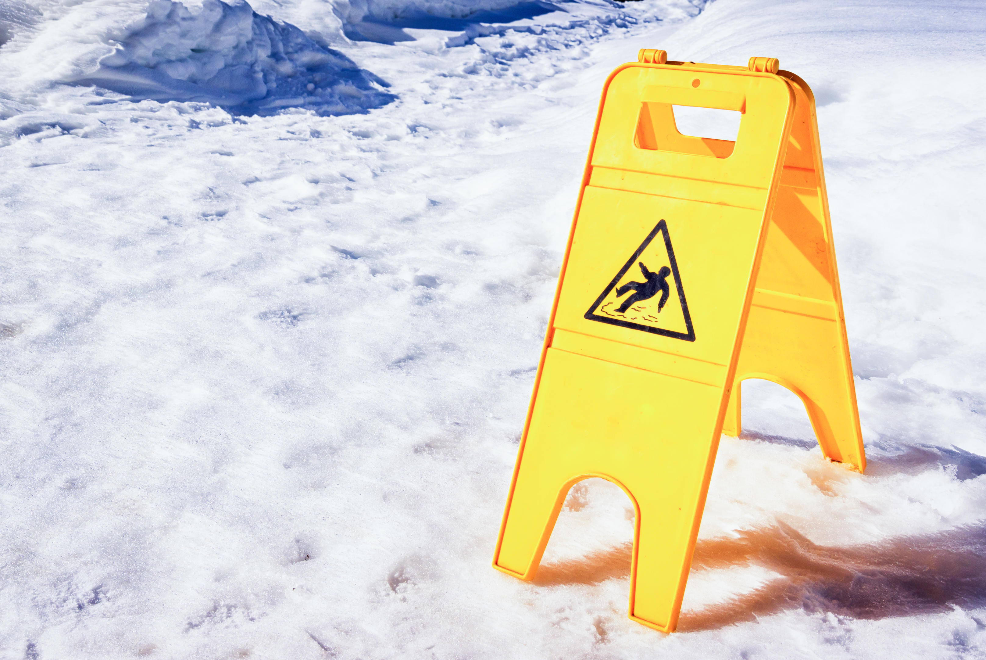 caution wet floor sign at an entrance