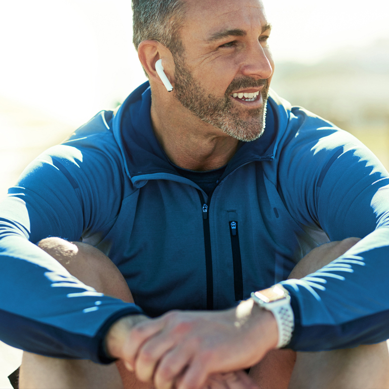man-fitness-training-listening-to-headphones