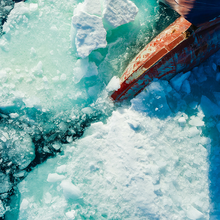 Bow of ice breaker going through ice in the Arctic Circle 768x768