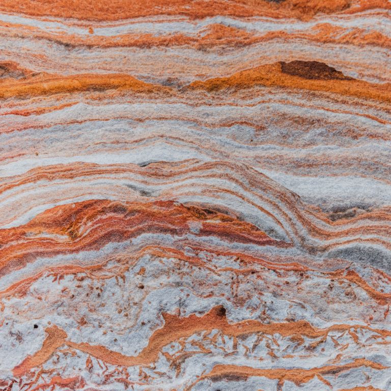 Colorful layers of stone found in natural setting