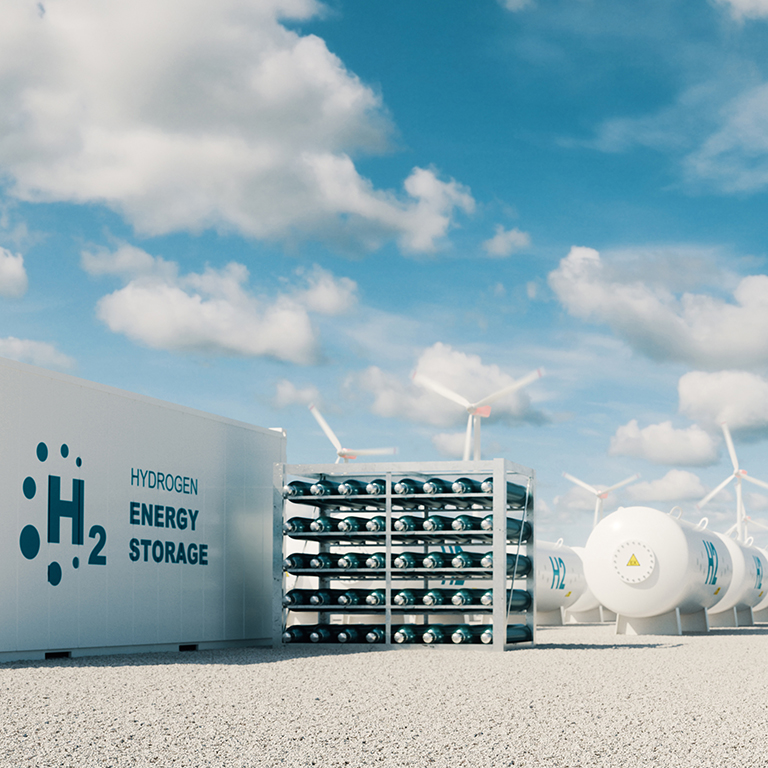 Modern hydrogen energy storage system accompaind by large solar power plant and wind turbine park in sunny summer afteroon light with blue sky and scattered clouds. 3d rendering.