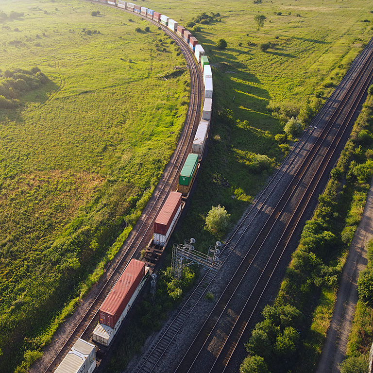 Aerial view of agricultural field with train