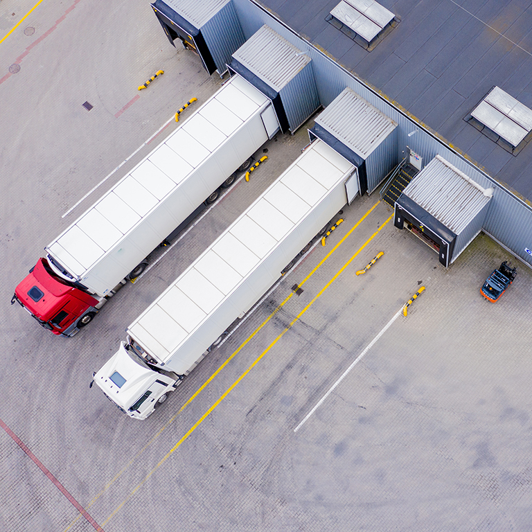 Aerial Shot of Industrial Warehouse/ Storage Building/ Loading