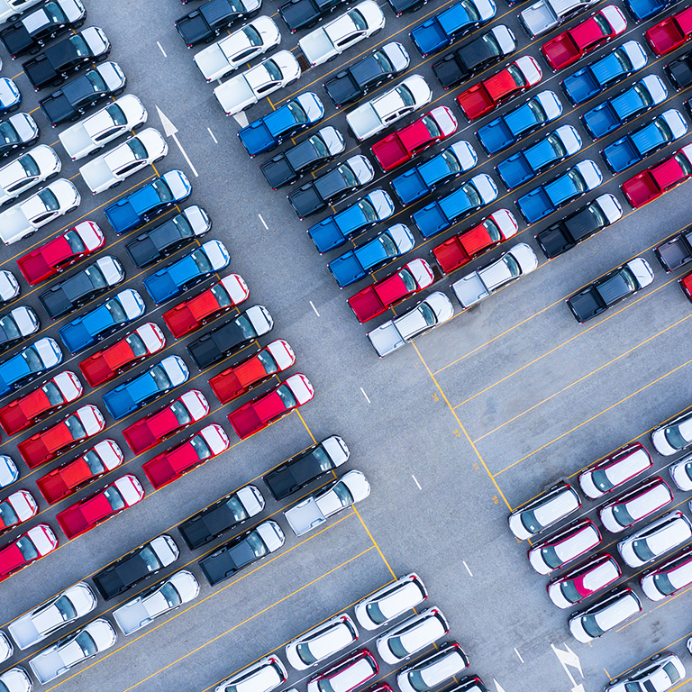 Aerial view new cars for sale stock lot row, New  Cars dealer inventory import export business logistic grobal.