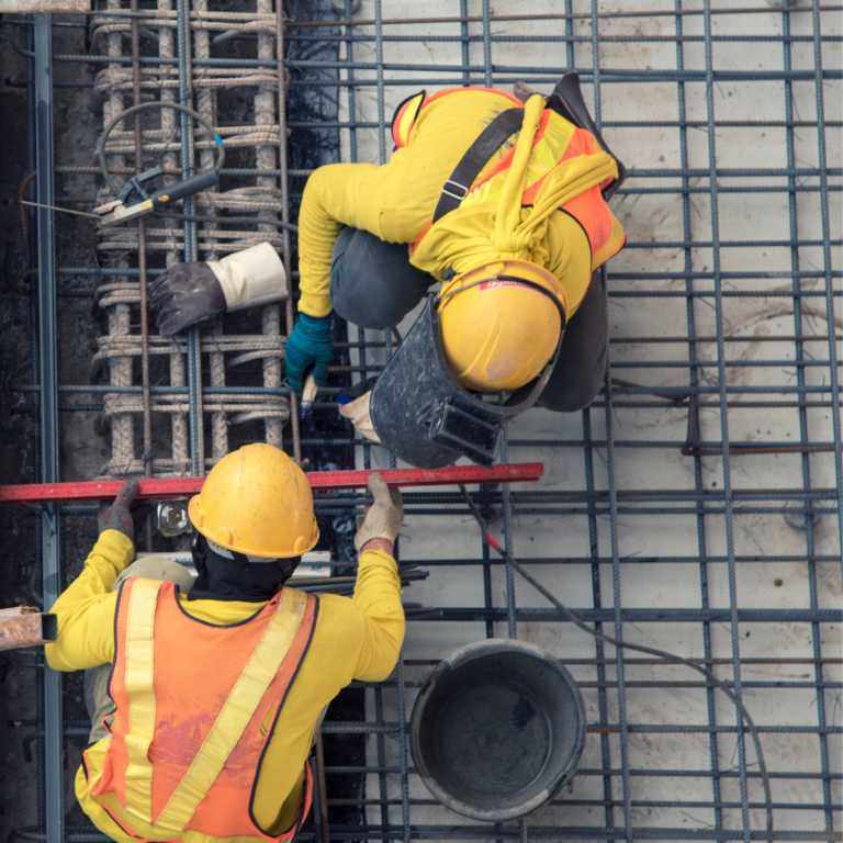 Aerial view of construction workers in construction site