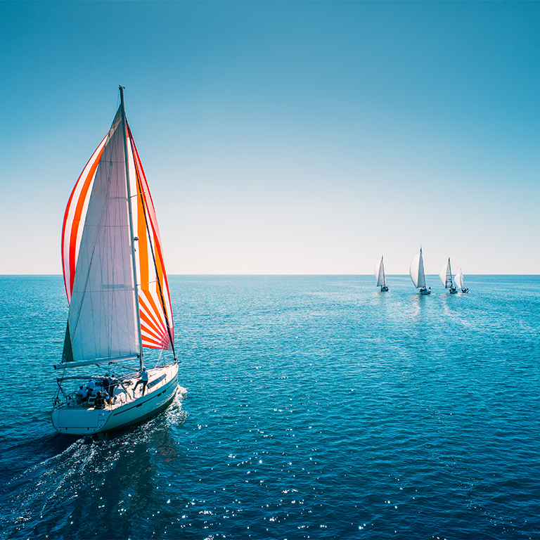 Aerial view of sailboat in windy condition