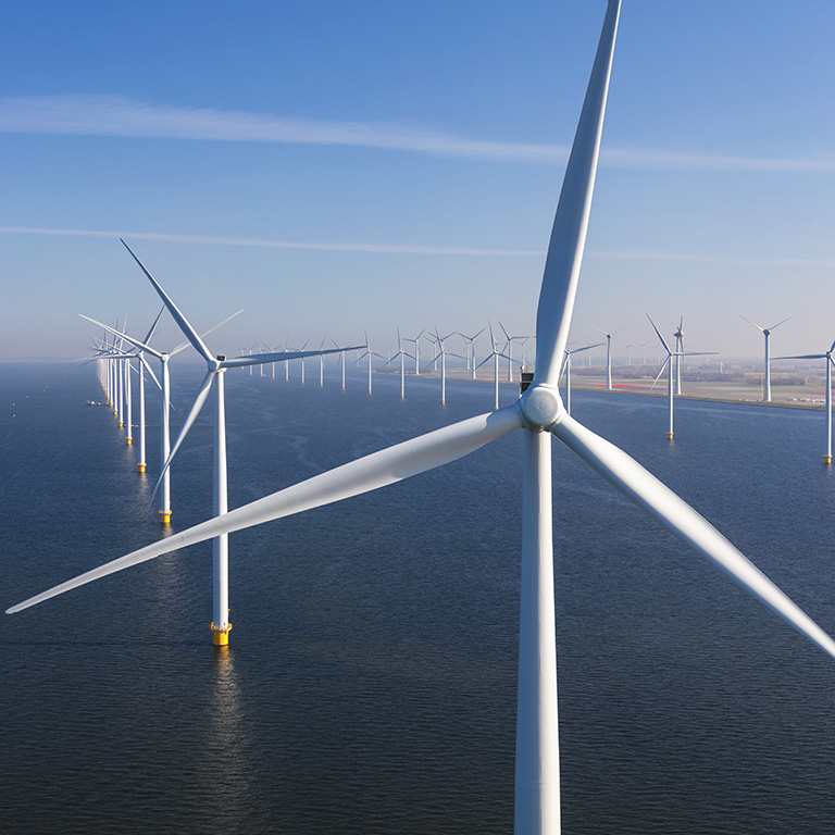 Aerial view of wind turbines at sea, North Holland, Netherlands