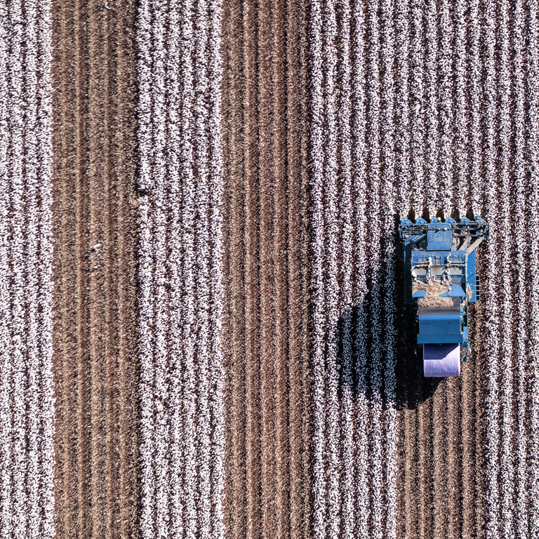 Top view on gricultural machinery works in the field