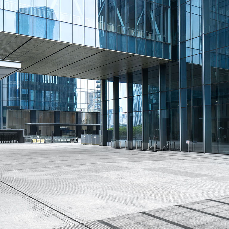 Panoramic skyline and buildings with empty concrete square floor