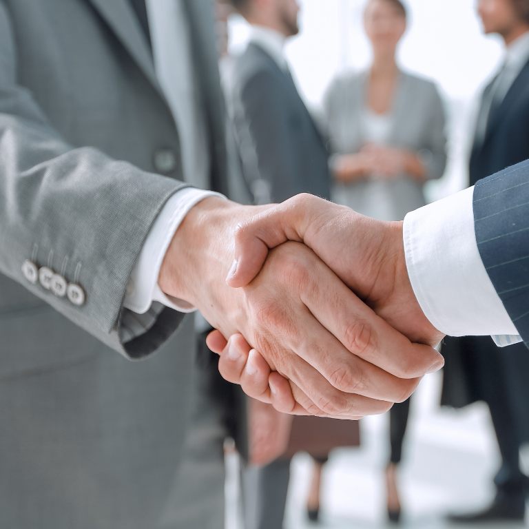 Business partner shaking hands