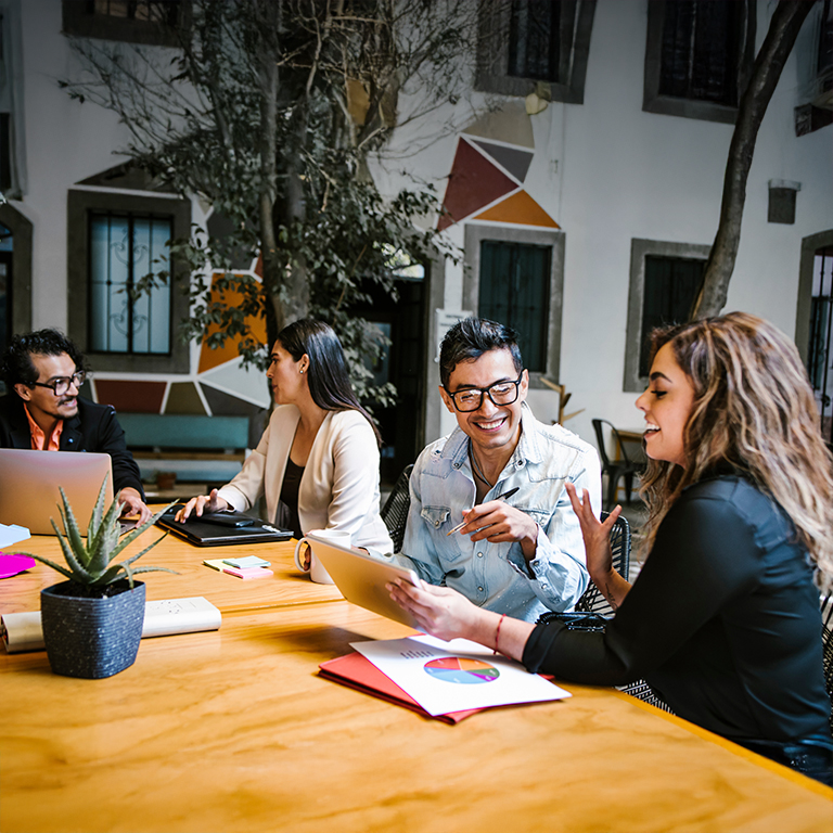 Business people discussing a project plan in office in Latin America