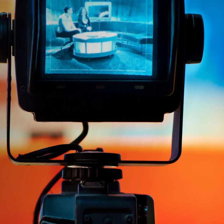 Video camera viewfinder - recording show in TV studio - focus on camera