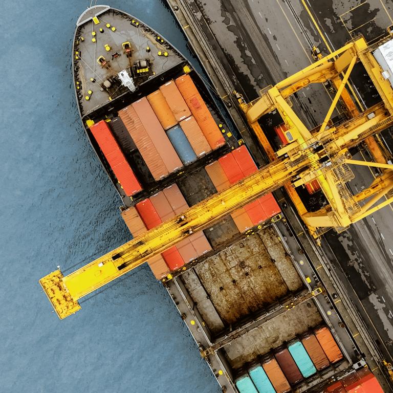 Cargo ship at port loading containers