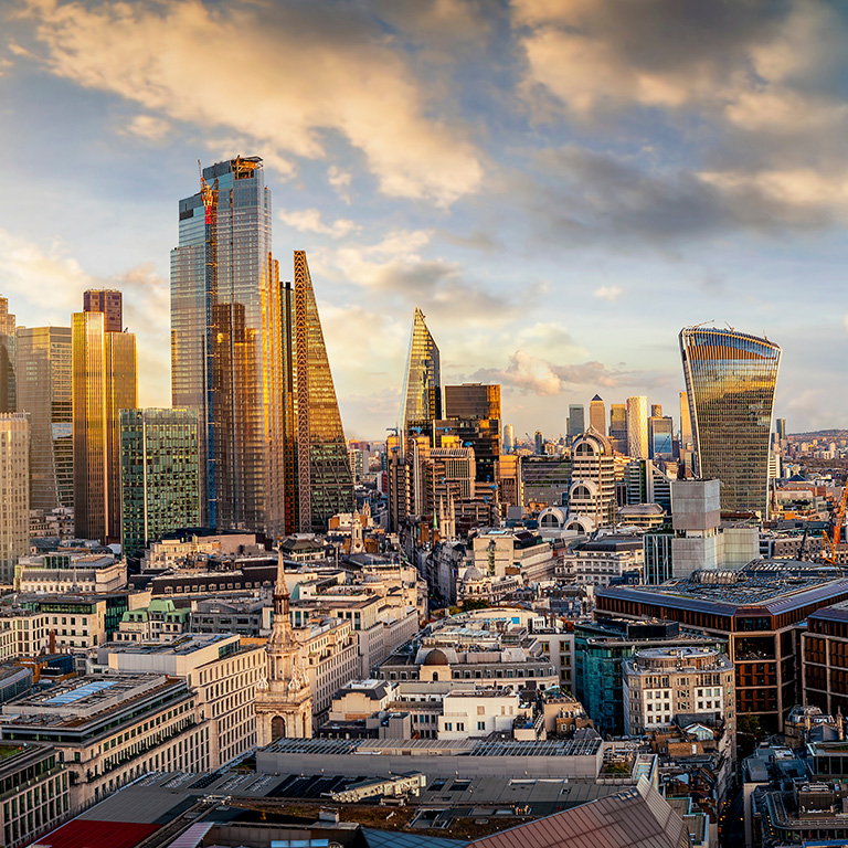 Sunset behind the modern skyscrapers of the London skyline, UK