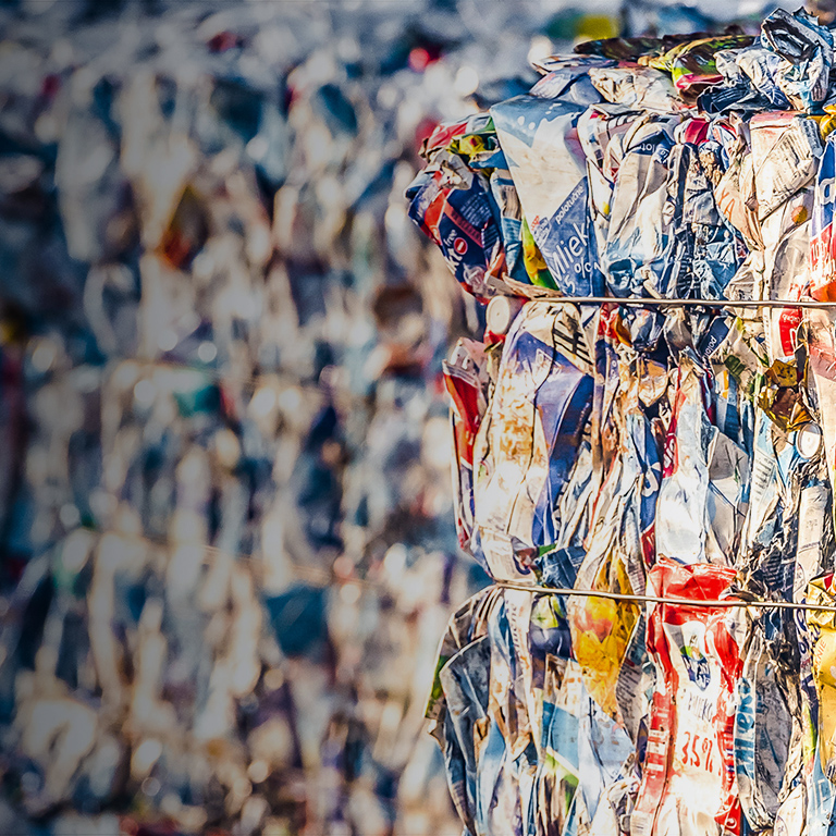 Recycling and storage of waste for further disposal, trash sorting. Recycled plastic waste pressed to bales. Plastic bottles, compressed.