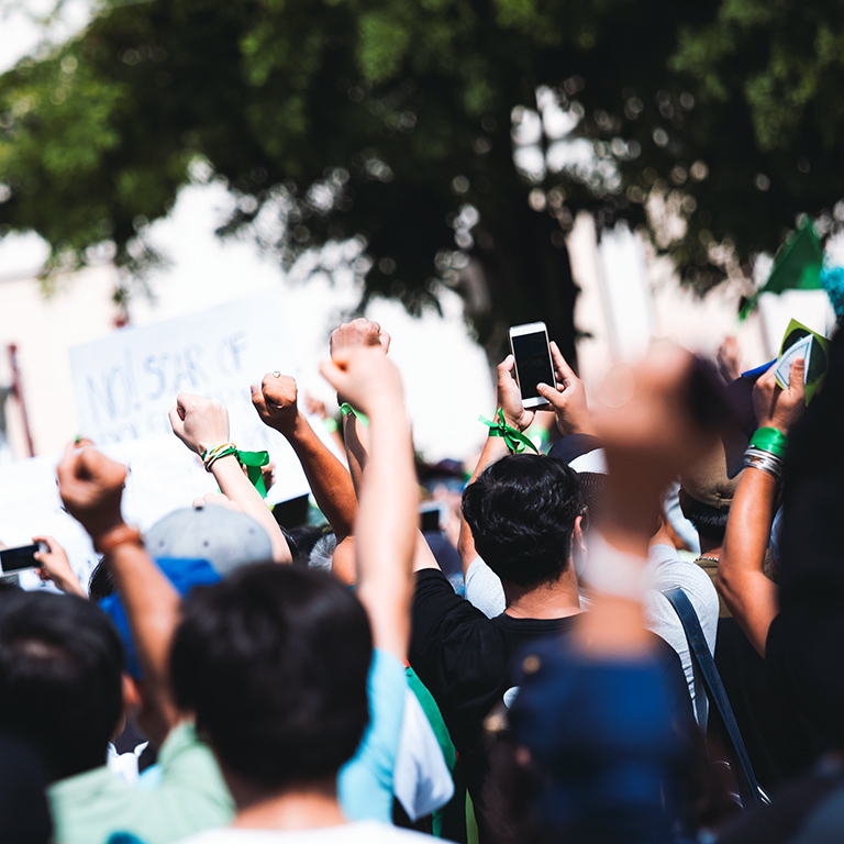 People raised hand air fighting for protest