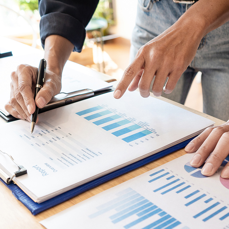 Business People Meeting to analyse and discuss and brainstorming the financial report chart data in office Financial advisor teamwork and accounting concept.