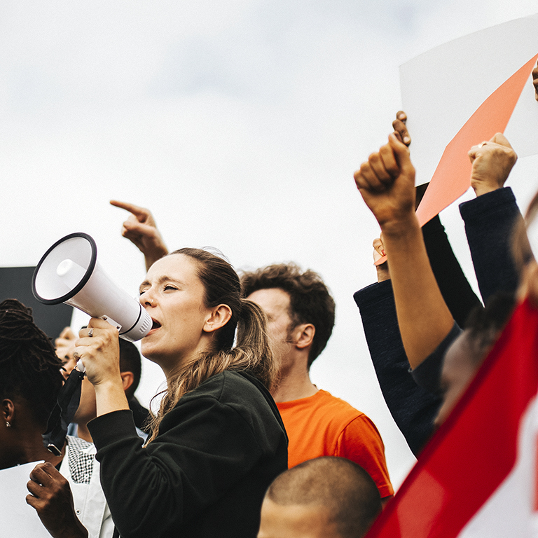 Group of young diversed activists is protesting