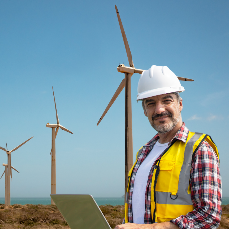 Engineer in yellow vests stand against rotating propellers