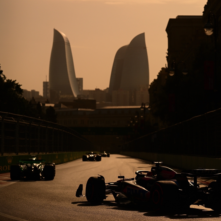 Formula 1 cars racing in the Baku urban circuit
