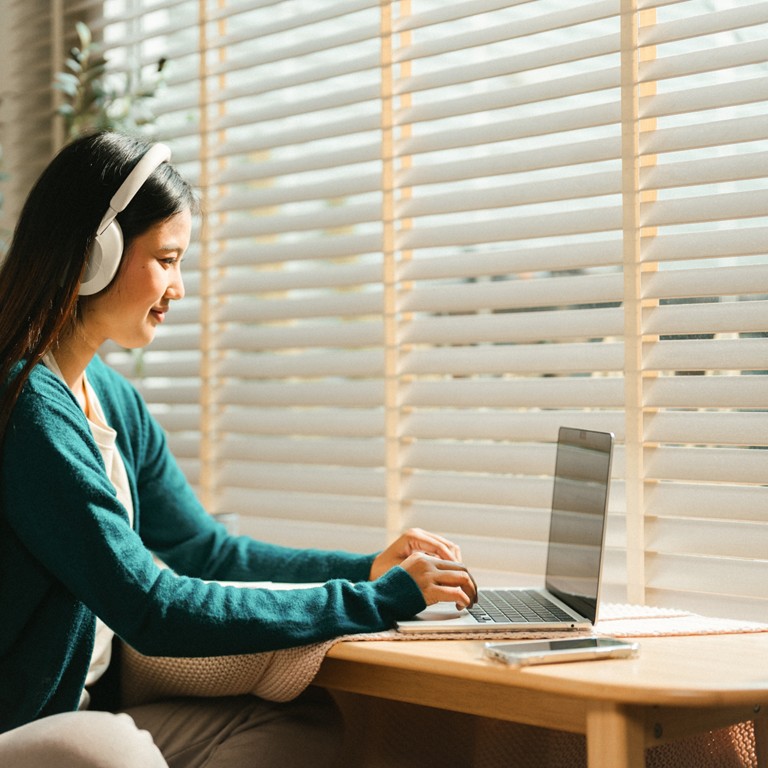 Female professional working on corporate computer
