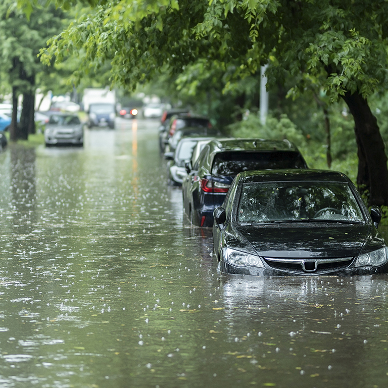 Flooded cars in the street