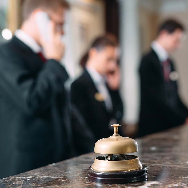 Hotel bell on reception desk
