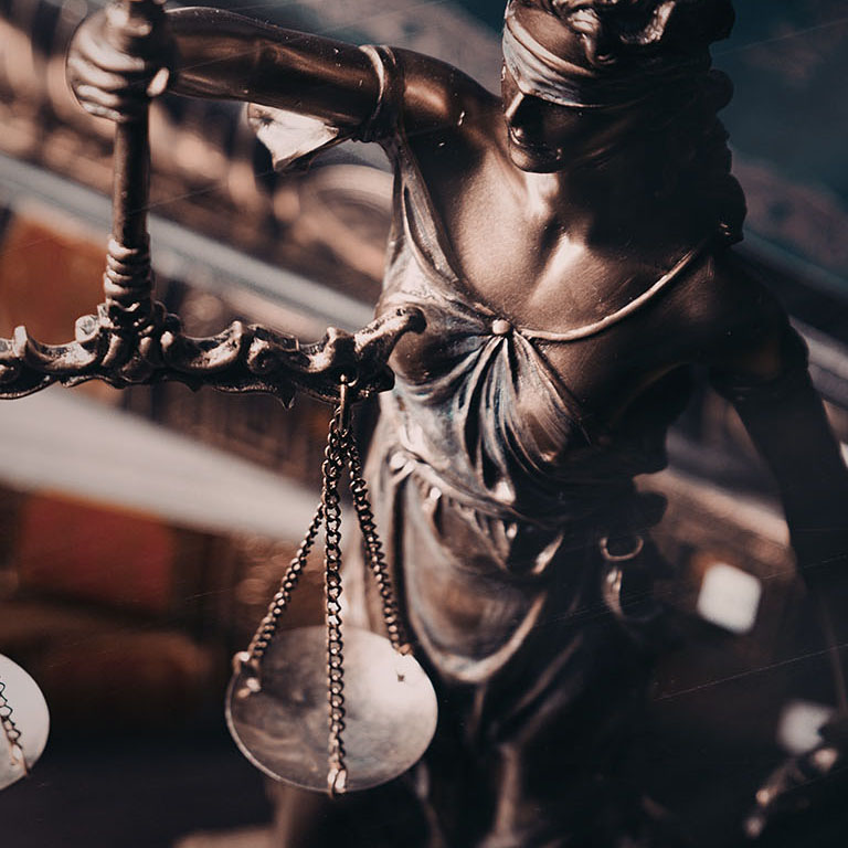 Lady justice. Statue of Justice in library. Legal and law background concept
