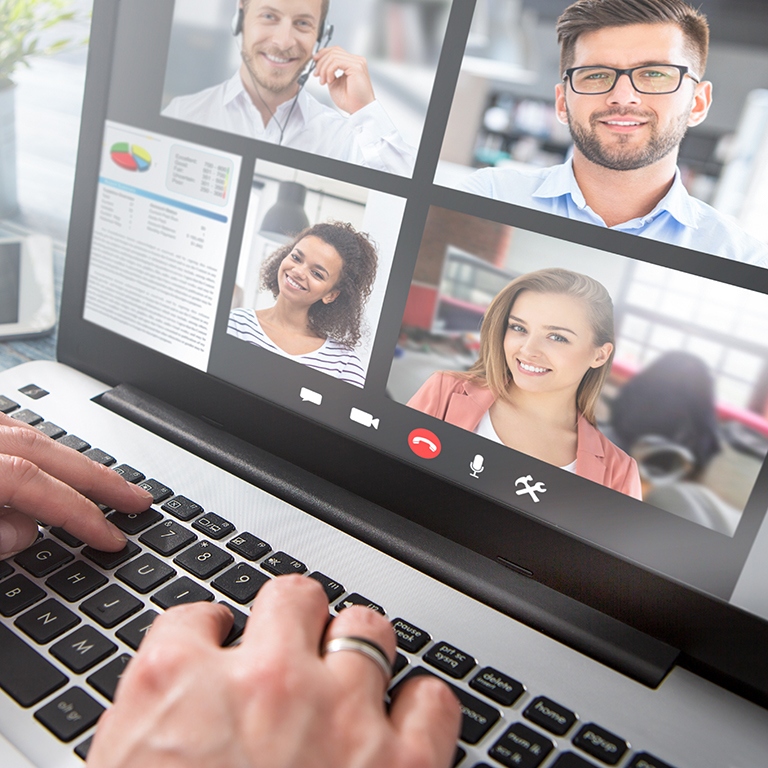 Businessman having a video conference on his laptop