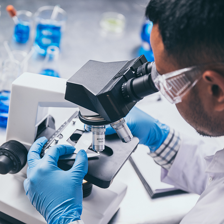 Health care researchers working in life science laboratory