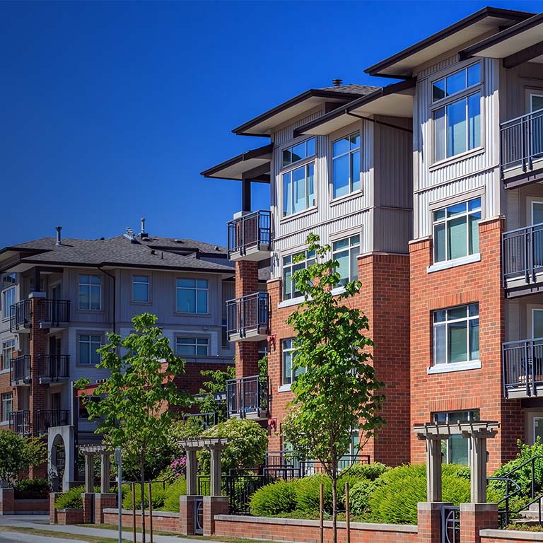 Modern residential apartment buildings with trees