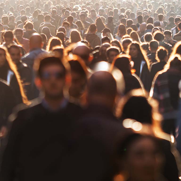 Blurred crowd of unrecognizable at the street