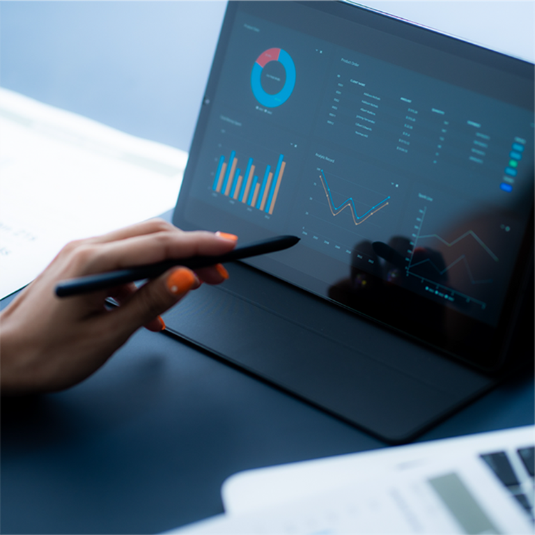 Person using a digital pen on tablet