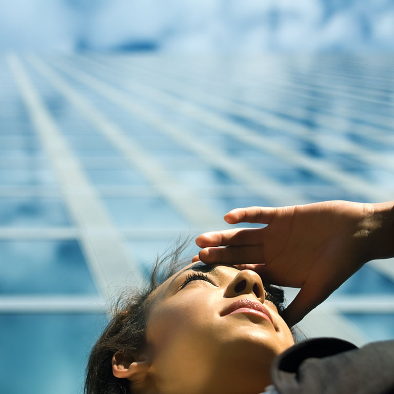 Skyscraper with woman look out to view