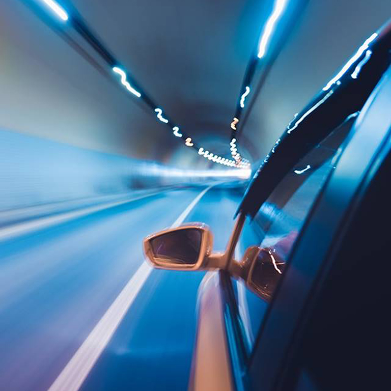 Speeding car in tunnel