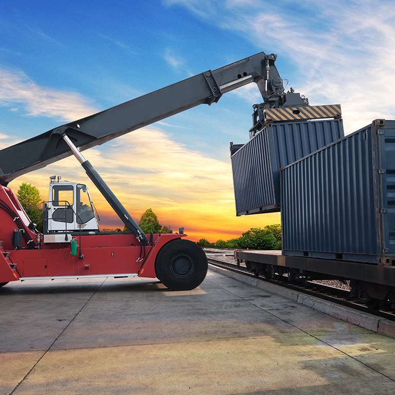 Stack of Freight Containers at the Docks with Truck