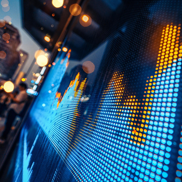 Perspective view of stock market growth, business investing and data concept with digital financial chart graphs