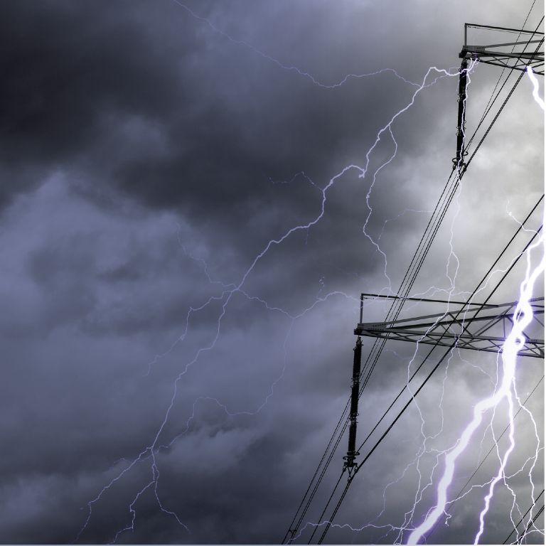 Thunderstorm near high voltage tower