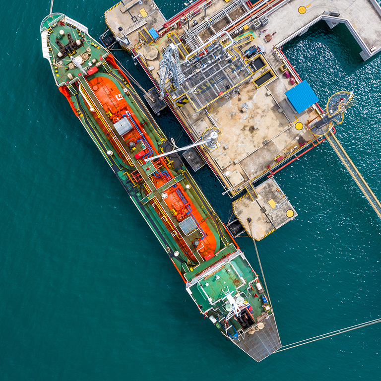 Ship tanker gas LPG, Aerial view Liquefied Petroleum Gas (LPG) tanker, Tanker ship logistic and transportation business oil and gas industry, Loading arm oil and gas offshore platforms.