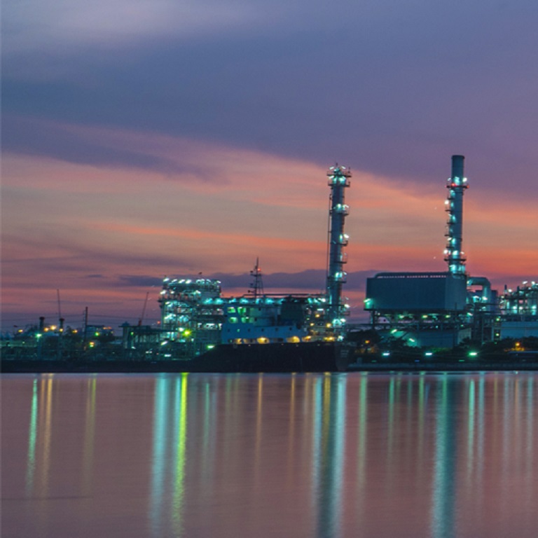 twilight of oil refinery in the morning