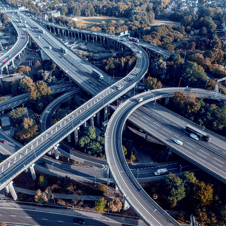 Vehicles Driving on a Spaghetti Junction Interchange near Birmingham the UK at Sunset