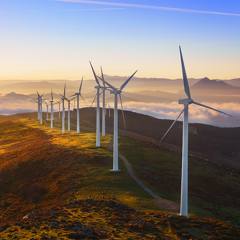 wind turbines in the Oiz eolic park at sunrise