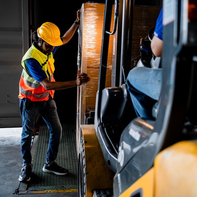 Worker during shipment of goods in a warehouse