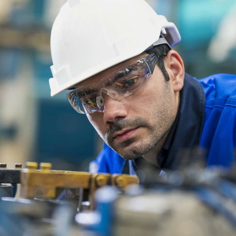 Worker inspects machinery marsh 768x768