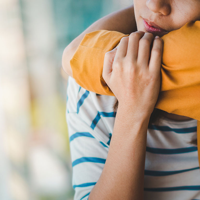 Young depressed asian woman hug her friend for encouragement, Selective focus, PTSD Mental health concept.